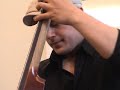 chris minh doky performs a song from his new album the nomad diaries on his yamaha silent bass at the yamaha store in london