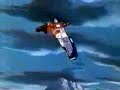 Optimus somersaults over some Decepticons while shooting