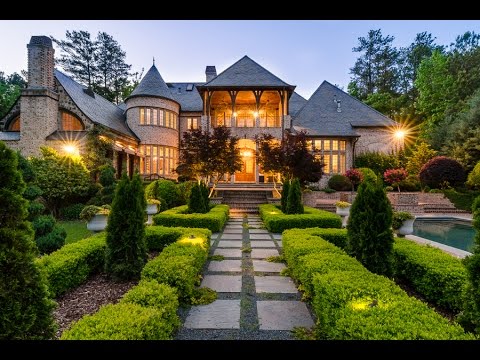 Manor - Custom built English manor home inspired by the prominent architect, Edwin Lutyens, whose influence is seen in the faades balance and symmetry enhanced by th...