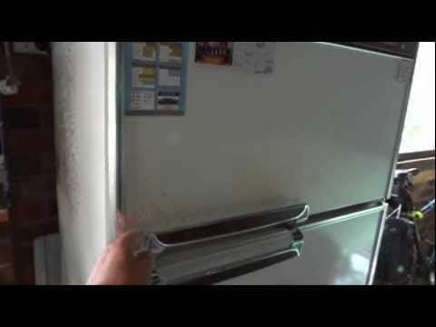 how to adjust fridge so door closes