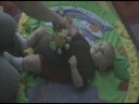 Laughing hard at his toy
