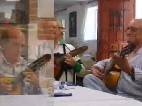Bandurriator - El trio formado por Rafael Suarez,Miguel Abascal y Julian Nuñez interpreta el pasodoble Amparito Roca . En el video se incorpora la pagina del arreglo realiz...
