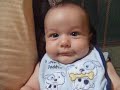 Ethan smiling and cooing
