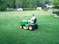 this x585 john deere really gets the job done !i have the 48c mulching deck on this 4x4 x585 great machine
