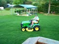 this x585 john deere really gets the job done !i have the 48c mulching deck on this 4x4 x585 great machine