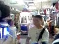 funny ass kid playin guitar hero at the beach