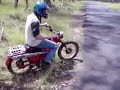 A postie bike being jumped, smoked, and generally thrashed all whilst being filmed.