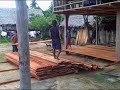 The men lay the boards for the Mother's Day Dance Floor