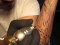 Stigma Arm Tattoo