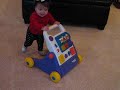 Giselle 10 months with push cart