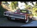 69 impala revving up, unmuffled