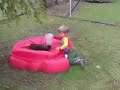 Jacob chasing Toby with water
