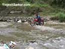 Me riding my Bajaj Pulsar 180 in a small stream before Chail in Himachal Pradesh in 2006.