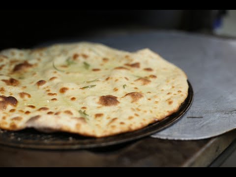 naan - Get our new free iPhone App: http://www.eateastindian.com/iphone Learn how to Naan at home without oven using simple ingredients like flour, egg, milk, yeast...