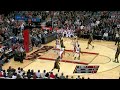 Dwyane Wade dunks on DeZmar DeRozen.