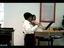 Madu and Parnov playing flute Madu and Parnov playing flute