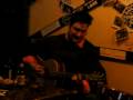 Neil playing guitar at Harry's, in Alpine, Texas, January 2009