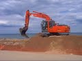 hitachi excavator moving sand