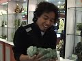 Zaed and Shah make fun of a lion jade statue sold in Beijing, China.