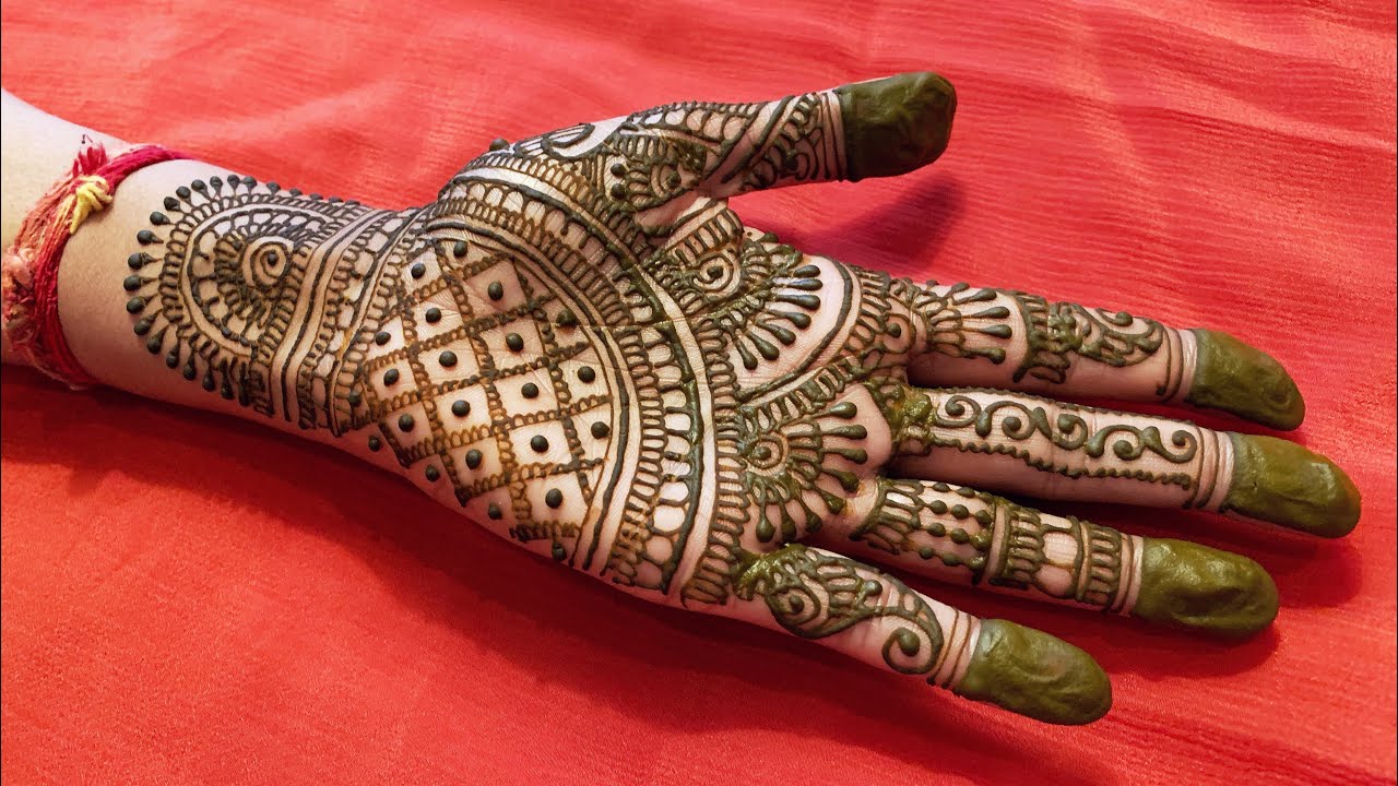 beautiful rajasthani half hand mehndi design