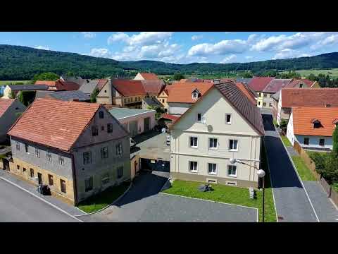 Video Areál pro podnikání zahrnující provozní budovu s byty, dílnami a sklady a budovu garáží-autodílen