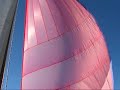 wooden skiff sailing