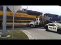 Video: Tow Truck Has Crazy Close Call With Train