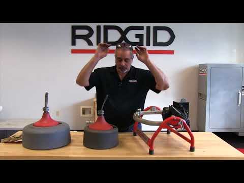 Installing the sink drum on the RIDGID K3800 drain cleaning machine