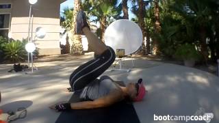 Core strength training reverse crunches with medicine ball