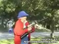 Crazy Grandma Tries to Shoot an Automatic Paintball Gun