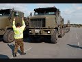 Oshkosh heavy equipment transporters.