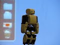 PLEN robot walking, kicking a ball and standing up PLEN robot walking, kicking a ball and standing up