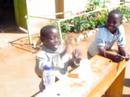 Ugandian child shows his art