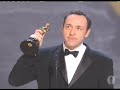 Gwyneth Paltrow presenting Kevin Spacey with the Best Actor Oscar® for his performance in 