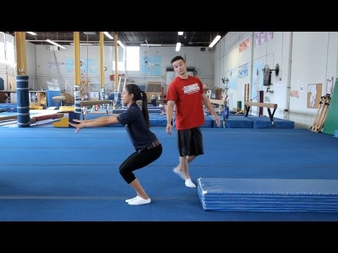 tuck - Watch more Gymnastics Training videos: http://www.howcast.com/videos/511374-How-to-Do-a-Back-Walkover-Gymnastics-Lessons Learn how to do a standing back tuck...