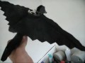 This is a quick introduction of my homemade Crow / Starling Blackbird Flapping Decoy which you can use for hunting crows or starling black birds. I constructed it from readily available materials. The flapping on the wings can be sped up by using more batteries. I used only one AA battery in this video. The flapping mechanics were constructed using chopsticks in a T pattern for the main frame with two sections of paper clips mounted on the T end for the pivot points, shish kabob skewers with paperclips shaped into long loops on the ends for the wing frames, and two short pieces of straw mounted perpendicular onto the skewers(the straws fit over the pivot points), an old t-shirt cutout for the wings, a small motor with sprocket mounted on it, I changed the paperclip section to a small straight nail mounted perpendicular on the sprocket (the loops of the wing frames fit over the small nail shaft on the sprocket). The bird body was made out of three pieces of cardboard cutout into a bird shape, and then stacked together for rigidity. Flat black spray paint was used to spray the wings and body. I shoved a small length of hanger wire into the cardboard of the body for the stake. Refer to the picture image of the simple ornithopter in the video for a better understanding of the flapping mechanics. I just swapped out the AA battery for a single D battery, and she flaps for over 6 hours now. Thanks for watching, and if you decide to make your own, I would be thrilled to see <b>...</b>