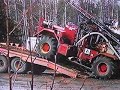LOADING THE ROC-CHAMP DRILL ONTO THE TILT TRAILER