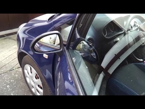 how to fit corsa c mirror glass