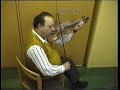 magyarul lsd. lennt. s�ndor �d�m (born: 1940) is playing the violin, accompanied by s�ndor cso�ri on contrafiddle.
he was double-bassist in the band of his father, the famous solo violinist istv�n �d�m, from the village of sz�k [sic, romania]. the collection contains some two hours of video recordings of this musician.
this recording was made around 1992 in budapest.

the sz�k slow dance is a traditional dance from sz�k.  
the tunes played in the sz�k slow dance style are among the most beautiful among the lyrical melodies of hungarian folk music. typically, a variety of different lyrics could be sung to the same tune. in the urban folk-dancing clubs, this melody was accompanied by the lyric that began: the cart is creaking, pulled by six fine oxen.
the discovery of music from the sz�k area had a profound impact on the birth of urban folk dancing culture in the 1970s.

we recommend that anyone who is interested in hungarian folk music become familiar with the sz�k music collected by l�szl� lajtha in the 1940s. 
title of the album: lajtha l�szl�: sz�ki gy?jt�s, produced by: seb? ferenc, published by hungaroton records 1985.

from the collection of s�ndor cso�ri.
-----------------------------------------
�d�m s�ndor 