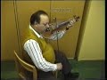 magyarul lsd. lennt. s�ndor �d�m (born: 1940) is playing the violin, accompanied by s�ndor cso�ri on contrafiddle.
he was double-bassist in the band of his father, the famous solo violinist istv�n �d�m, from the village of sz�k [sic, romania]. the collection contains some two hours of video recordings of this musician.
this recording was made around 1992 in budapest.

the sz�k slow dance is a traditional dance from sz�k.  
the tunes played in the sz�k slow dance style are among the most beautiful among the lyrical melodies of hungarian folk music. typically, a variety of different lyrics could be sung to the same tune. in the urban folk-dancing clubs, this melody was accompanied by the lyric that began: the cart is creaking, pulled by six fine oxen.
the discovery of music from the sz�k area had a profound impact on the birth of urban folk dancing culture in the 1970s.

we recommend that anyone who is interested in hungarian folk music become familiar with the sz�k music collected by l�szl� lajtha in the 1940s. 
title of the album: lajtha l�szl�: sz�ki gy?jt�s, produced by: seb? ferenc, published by hungaroton records 1985.

from the collection of s�ndor cso�ri.
-----------------------------------------
�d�m s�ndor 