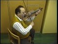magyarul lsd. lennt. s�ndor �d�m (born: 1940) is playing the violin, accompanied by s�ndor cso�ri on contrafiddle.
he was double-bassist in the band of his father, the famous solo violinist istv�n �d�m, from the village of sz�k [sic, romania]. the collection contains some two hours of video recordings of this musician.
this recording was made around 1992 in budapest.

the sz�k slow dance is a traditional dance from sz�k.  
the tunes played in the sz�k slow dance style are among the most beautiful among the lyrical melodies of hungarian folk music. typically, a variety of different lyrics could be sung to the same tune. in the urban folk-dancing clubs, this melody was accompanied by the lyric that began: the cart is creaking, pulled by six fine oxen.
the discovery of music from the sz�k area had a profound impact on the birth of urban folk dancing culture in the 1970s.

we recommend that anyone who is interested in hungarian folk music become familiar with the sz�k music collected by l�szl� lajtha in the 1940s. 
title of the album: lajtha l�szl�: sz�ki gy?jt�s, produced by: seb? ferenc, published by hungaroton records 1985.

from the collection of s�ndor cso�ri.
-----------------------------------------
�d�m s�ndor 