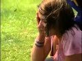 women takes water melon to the face