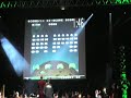 video games live (vgl) finally came to lisbon this is one of the spectators plying a slightly altered version of space invaders. sad he wasn't able to finish it in under 2 minutes, he would have one a video games live original, an arcade box with over 5000 classic mame arcade games... :( check out the rest of the playlist for the other songs. a recording by crisxed and drexer.