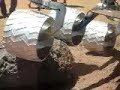 Mars Science Laboratory wheels roll over rocks