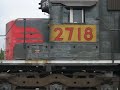 a trio of mk rebuilt sd40m-2's street running over 9th street in colton, ca over former pacific electric territory.

crossings protected by mechanical flagman 