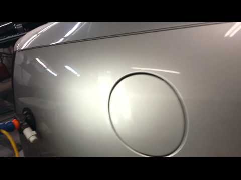 Paintless dent repair on 05 Cadillac STS