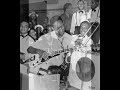 charlie christian is generally recognised as the person who popularised the electric guitar (although not the first) and who changed everyone's thinking about how jazz could be played on it.  

as well as playing guitar for benny goodman, charlie participated in after hours jam sessions with other musicians in places such as mintons and monroes in new york city.  on 12 may 1941 charlie played 'swing to bop' at mintons, with joe guy on trumpet, kenny kersey on piano, nick fenton on bass and kenny clarke on drums.  this live track excerpt is characterised by longer solos than charlie would typically play with goodman, and is a good indication of his incredible improvisational abilities. his influence on guitarists then and since has been massive. 

sadly, there is no film available of charlie christian playing live, so i have included a slide show for this track. 
 
comments welcome.