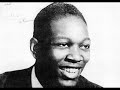 charlie christian is generally recognised as the person who popularised the electric guitar (although not the first) and who changed everyone's thinking about how jazz could be played on it.  

as well as playing guitar for benny goodman, charlie participated in after hours jam sessions with other musicians in places such as mintons and monroes in new york city.  on 12 may 1941 charlie played 'swing to bop' at mintons, with joe guy on trumpet, kenny kersey on piano, nick fenton on bass and kenny clarke on drums.  this live track excerpt is characterised by longer solos than charlie would typically play with goodman, and is a good indication of his incredible improvisational abilities. his influence on guitarists then and since has been massive. 

sadly, there is no film available of charlie christian playing live, so i have included a slide show for this track. 
 
comments welcome.