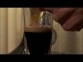 the absinthe twins make a b-52, an absinthe cocktail, from christian jaborg's absinthe cocktail guide. 

the recipe is 3 cl of coffee liqueur, 3 cl of irish cream and 3 cl of absinthe. layer the irish cream and absinthe on top of the coffee liqueur. ignite, extinguish and slam it!

as you can see the absinthe twins did not follow the exact recipe because only the last drops of a bottle of verte de fougerrolles were available at the time. 

the absinthe twins rarely mix absinthe with anything other than water and certainly do not recommend lighting absinthe but there are some very interesting recipe's in christian's book that are worth trying.

featuring original music written, performed and produced by the absinthe twins.