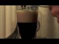 the absinthe twins make a b-52, an absinthe cocktail, from christian jaborg's absinthe cocktail guide. 

the recipe is 3 cl of coffee liqueur, 3 cl of irish cream and 3 cl of absinthe. layer the irish cream and absinthe on top of the coffee liqueur. ignite, extinguish and slam it!

as you can see the absinthe twins did not follow the exact recipe because only the last drops of a bottle of verte de fougerrolles were available at the time. 

the absinthe twins rarely mix absinthe with anything other than water and certainly do not recommend lighting absinthe but there are some very interesting recipe's in christian's book that are worth trying.

featuring original music written, performed and produced by the absinthe twins.